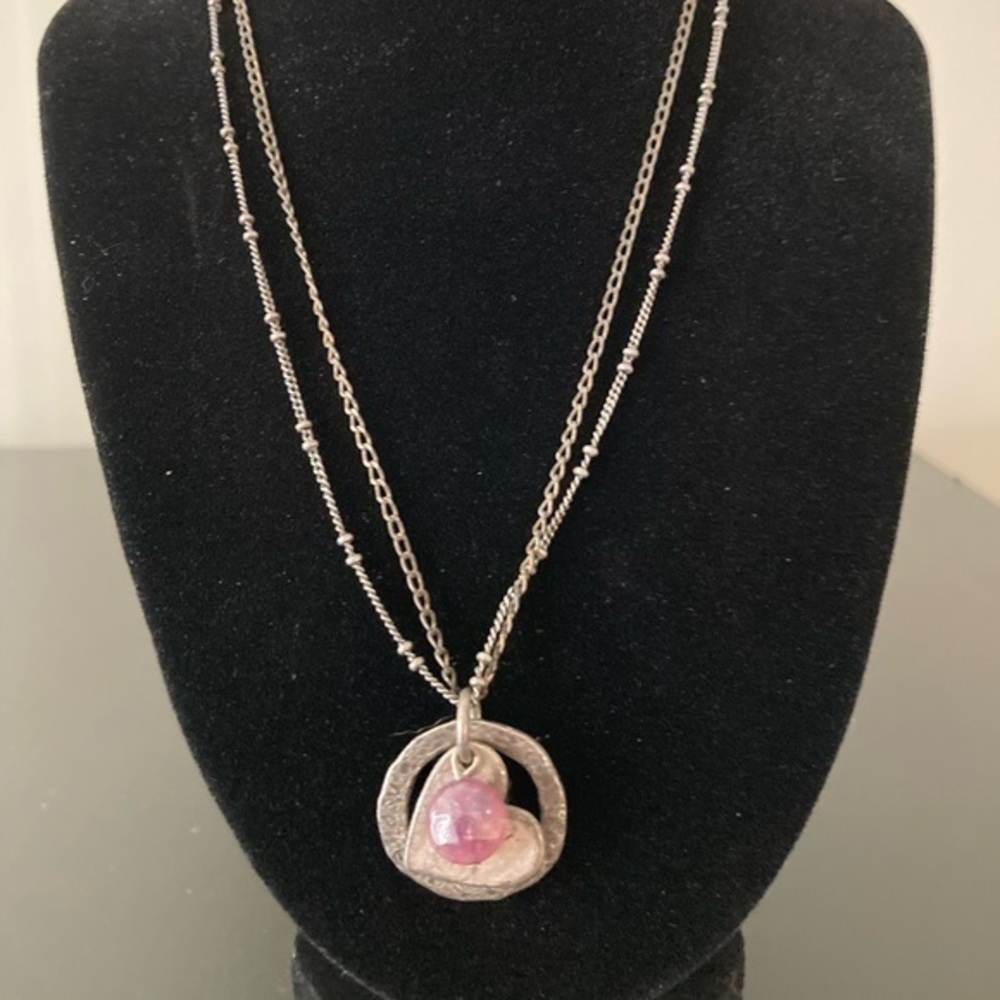 Claire’s  and silver tone necklace with heart pendant
